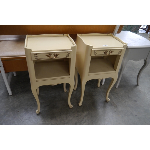 2402 - A pair of French bedside cupboards