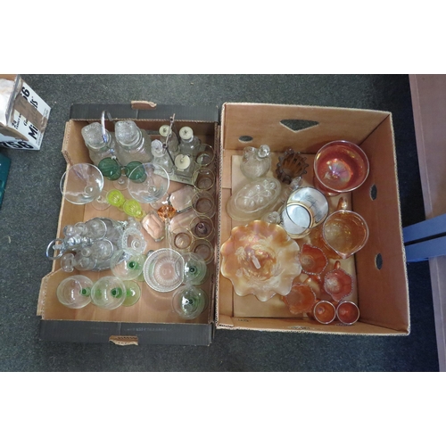 1218 - Two boxes of glassware including carnival glass, drinking glasses etc.