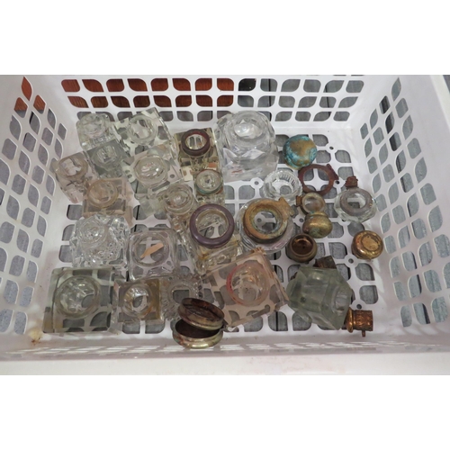 1226 - A box of glass inkwells and lids