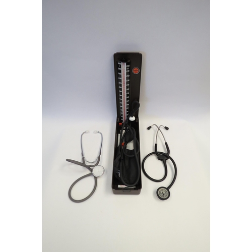 1250 - An Accoson sphygmomanometer together with a Littman stethoscope and one other (3)