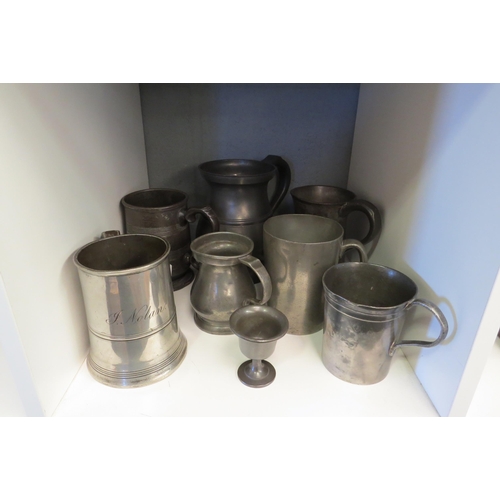 1258 - A collection of eight vintage pewter beer mugs, including chocolate pots