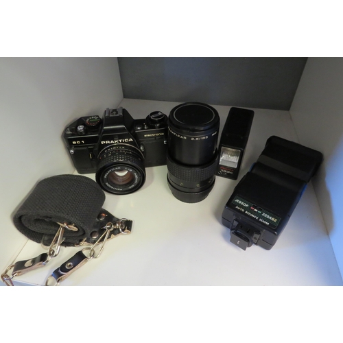 1263 - A Praktica Pentacon BC1 50mm lens camera and a Praktica Carl Zeiss Gena 3.5/135 MC lens with other a... 