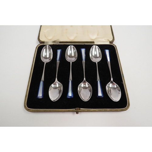 1270 - A cased set of six Art Deco silver teaspoons with mother-of-pearl set terminals.  Sheffield 1929.  W... 