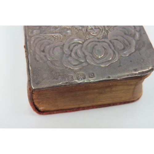 1294 - A miniature antique silver fronted Hymn book, with angel decoration.  Birmingham 1904