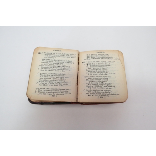 1294 - A miniature antique silver fronted Hymn book, with angel decoration.  Birmingham 1904