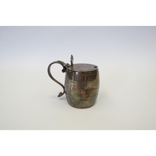 1316 - A silver barrel from mustard with blue glass liner.  Chester 1913.  Stokes & Ireland Ltd.  Weight ap... 