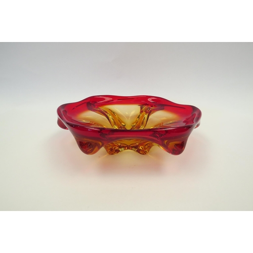 1327 - A heavy Art Glass bowl in red and yellow, 23cm diameter