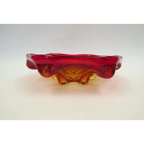 1327 - A heavy Art Glass bowl in red and yellow, 23cm diameter