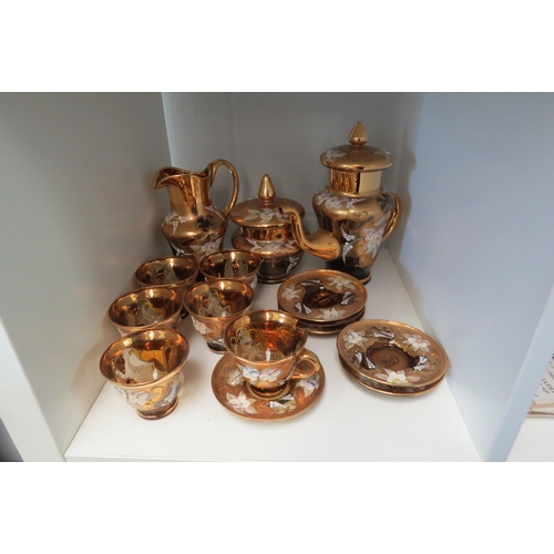 1336 - A quantity of Venetian glass tea wares, gold with floral relief, some damage