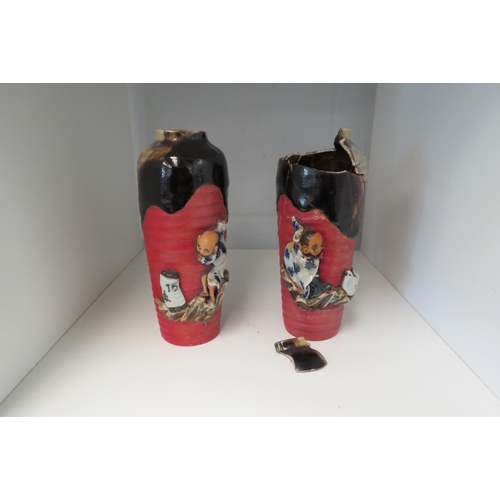 1338 - Two Japanese Sumida pottery vases with applied figural design, both damaged, 17cm tall