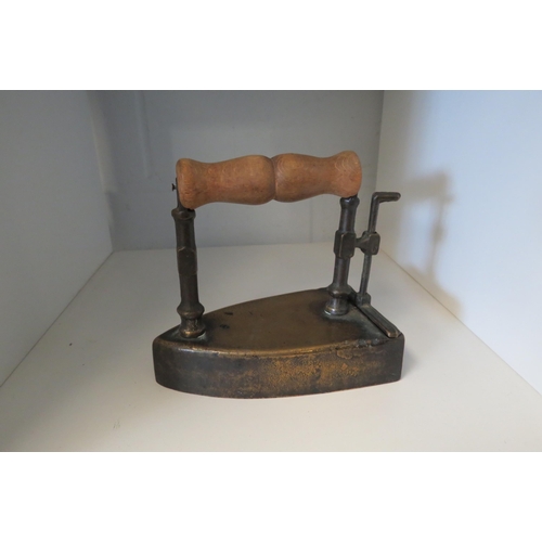 1362 - A Victorian iron with original heat block