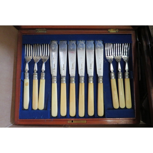 1403 - A box containing flatware, including loose and cased, coffee bean spoons, fish knives and forks etc.