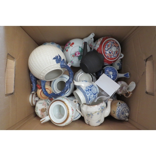 1426 - A box of miscellaneous ceramics, teapots, etc. some a/f