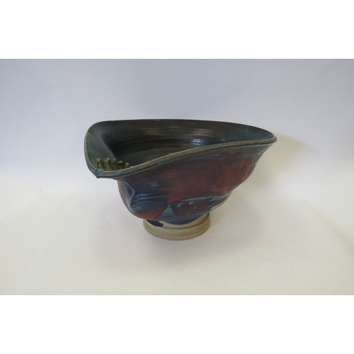 1438 - A Studio Pottery abstract form bowl, 16cm tall   (R) £20