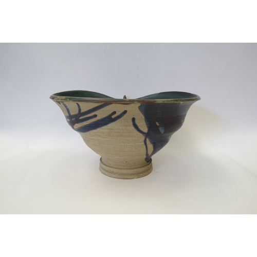 1438 - A Studio Pottery abstract form bowl, 16cm tall   (R) £20