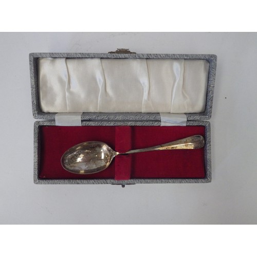 1090 - Four various silver napkin rings. A silver cigarette box, Birmingham 1955. Two boxed silver spoons i... 