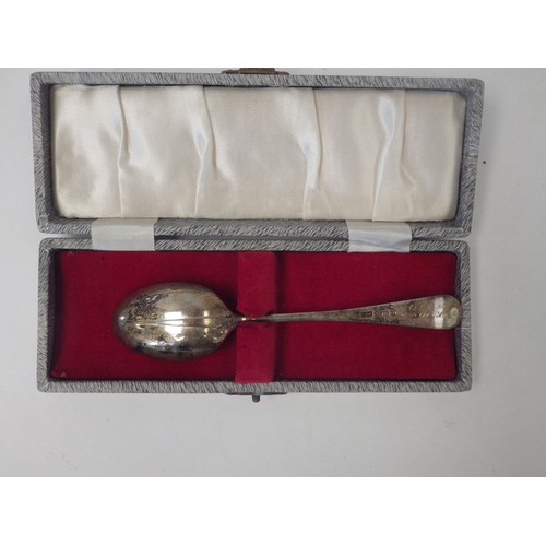 1090 - Four various silver napkin rings. A silver cigarette box, Birmingham 1955. Two boxed silver spoons i... 