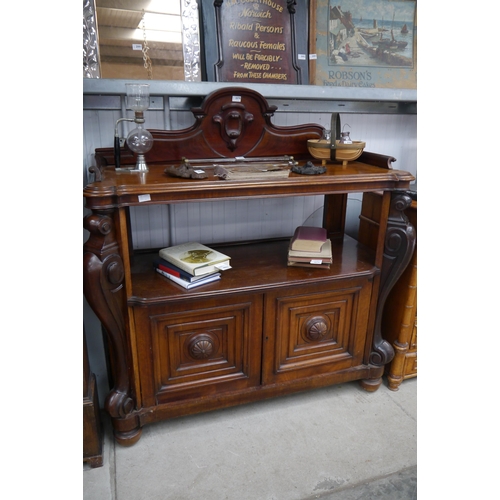 2079 - A Victorian mahogany and walnut two tier buffet, two tiers with two door cupboard to base, scrolled ... 