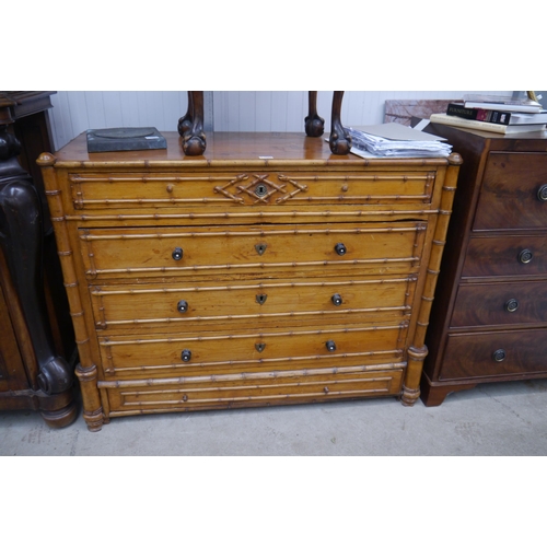 2086 - A Victorian pine chest of five drawers with faux bamboo decoration