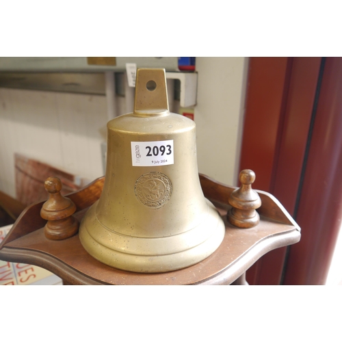 2093 - A brass 12oz bell, stamped 