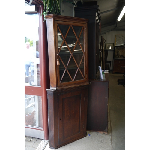 2096 - Two Georgian oak corner cupboards one glazed