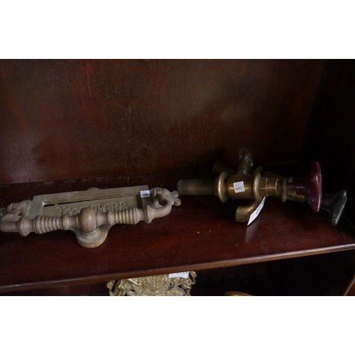 2126 - A Victorian brass letterbox and a pair of vintage brass taps