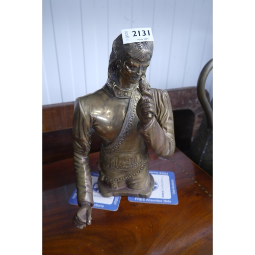 2131 - A brass figure of a singer