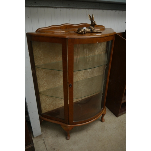 2137 - A 1930's walnut bowfronted display cabinet