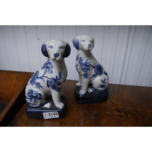 2145 - A pair of blue and white china dogs