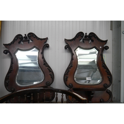 2163 - A pair of Edwardian mahogany mirror wall brackets