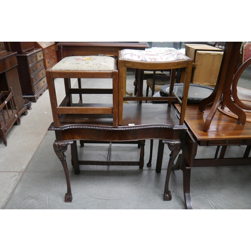 2166 - Probably Irish a 19th Century serpentine front mahogany side table on carved cabriole fore legs