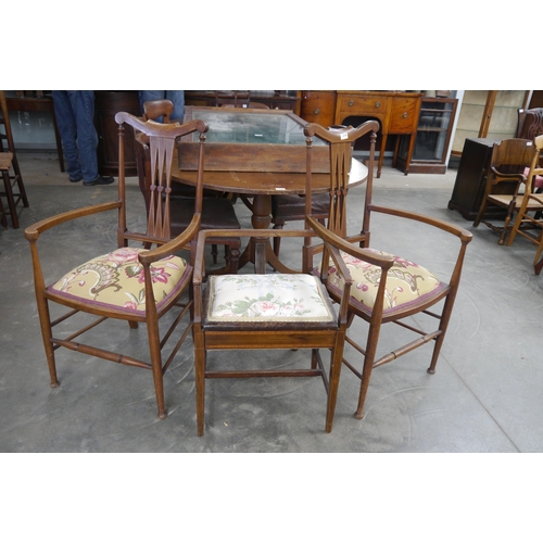 2191 - Two Edwardian mahogany inlaid elbow  chairs with pierced splat and music stool