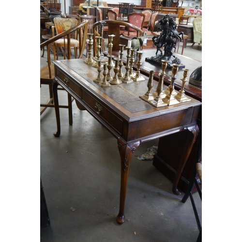 2203 - A walnut writing desk, leather top a/f, twin frieze drawers, carved knees to pad feet, for renovatio... 