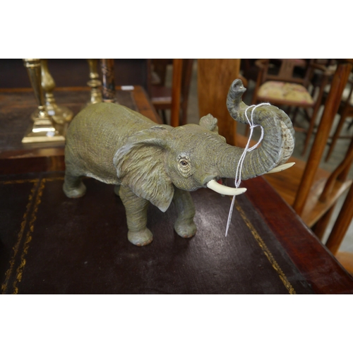 2208 - A cold painted bronze study of a Bull elephant 45cm long   (R) £300