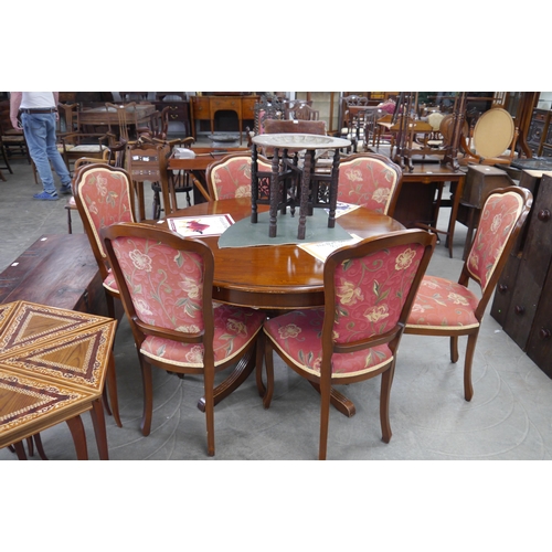 2229 - A circular extending dining table with six chairs   (E) £60-90