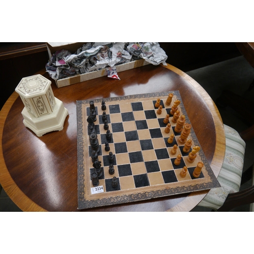 2234 - A Victorian wooden chess set with leather board