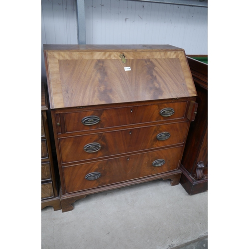 2256 - A 19th Century flame mahogany bureau