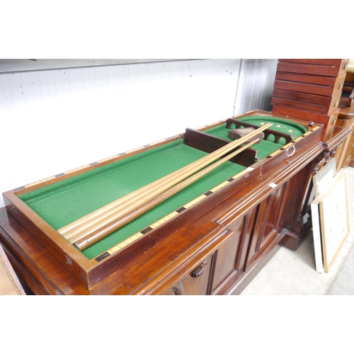 2258 - An E.J. Riley bagatelle board with balls and cues