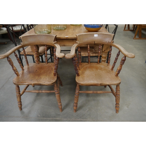 2283 - A pair of Victorian oak Captains chairs   (C)