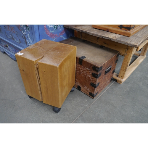 2285 - A timber block stool on castors and a box