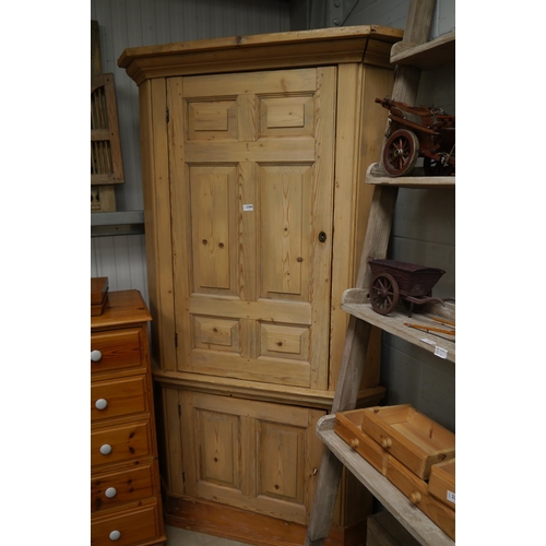 2308 - A Georgian pine full height corner cupboard with shaped shelved interior   (R) £100