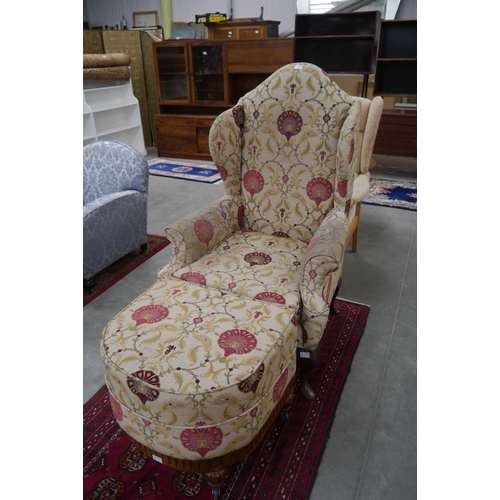 2347 - A Georgian style wing back armchair on carved cabriole front supports, together with a similarly uph... 