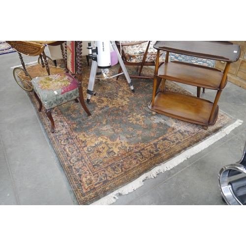 2355 - A green, gold and blue ground lounge rug 182 x 274cm   (E) £40-60