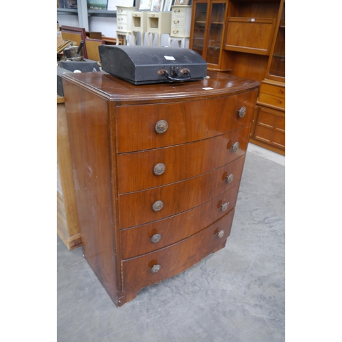 2373 - A walnut chest of five drawes