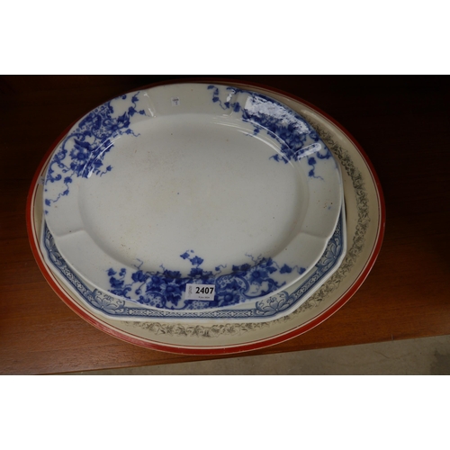 2407 - Three decorative pottery serving plates   (R) £10