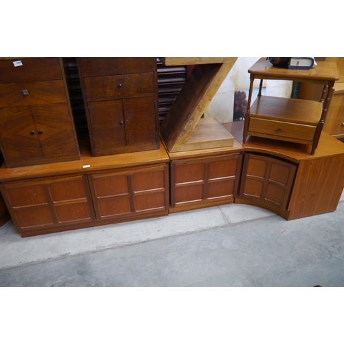 2410 - A Nathan teak corner unit and sideboard and a Nathan square occasional table   (E) £20-30