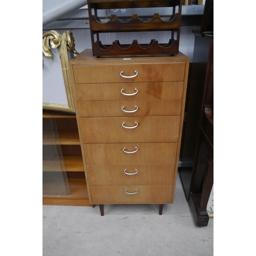 2424 - A 1960/70's chest of seven drawers