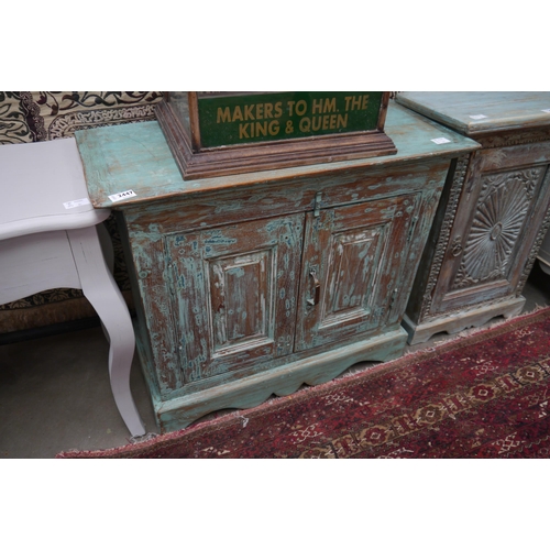 2447 - An Indian rustic painted hardwood low cabinet