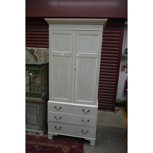 2450 - A grey painted cabinet of slim proportions, the two door panelled top over three long drawers