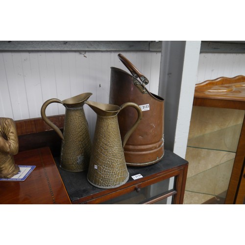 2133 - Two Edwardian brass jugs and copper coal shute